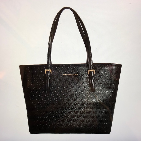 Michael Kors Handbags - NWT Michael Kors monogram carry all tote